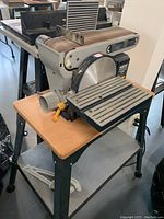 Front view of belt/disc sander on stand