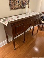 Three‐quarter view of cabinet showing top surface and left side