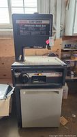 Front view of the Sears Craftsman 12" electronic band saw showing the work table, blade, and control panel.
