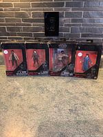 Four Star Wars Black Series sealed action figures in original boxes with some wear visible on packaging.