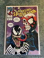 Comic book cover showing Venom holding a skull with Spider-Man mask design and speech bubbles.