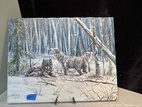 Full frontal view of the oil painting showing three wolves in a snowy forest scene.