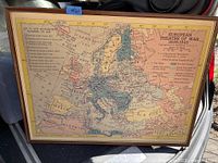 Framed vintage map showing the European Theatre of War from 1939-1945 with boundaries and routes marked.