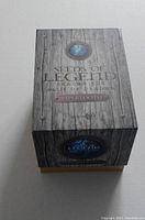 Box exterior with 'Seeds of Legend Dragon Egg Vipertooth' labeling in wood pattern design.