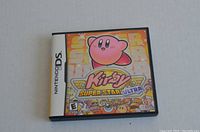 Front cover of game case showing Kirby Super Star Ultra for Nintendo DS