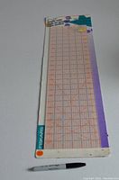 Front view of Fiskars 6x24 inch quilting ruler with orange grid markings and branding, measuring tool for fabric cutting and quilting.