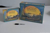 Front view of two boxed items: the Seafarers Expansion and the 5-6 Player Extension for Catan Seafarers, each sealed and showing cover artwork.