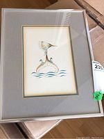 Front view of framed print showing entire piece and mat under glass