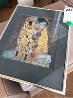 Front view of framed print showing full image, mat, and frame
