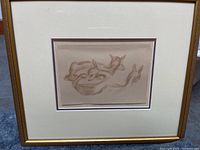 Frontal view of framed pastel drawing showing composition, matting, frame and glazing