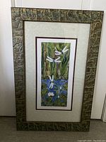 Full view of the framed print showing dragonflies over a pond with lily pads and tall grass.