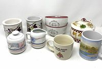Photo showing all items in the lot: cheese pot with lid and spoon, 2 dip chillers, cream and sugar set, mugs, and bowls.
