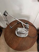 Full view of Emesco 92N engine with dentist/lab drill arm mounted on wood surface