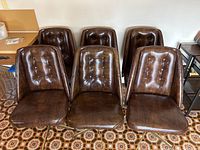 All six chairs arranged in two rows, front view