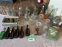 Overview of all items including bottles, scale, lantern, and first aid kit.