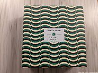 Closed box of the Games Room Casino Night Game showing geometric patterned cover with logo