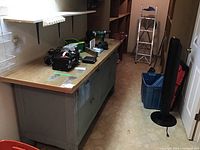 Front left angle showing full workbench and mounted vise