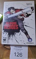 Front cover of No More Heroes game case for the Wii featuring main character artwork and branding.