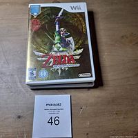 Top-down photo of The Legend of Zelda Skyward Sword Limited Edition Wii game case showing front cover with Link wielding a sword and title logo.
