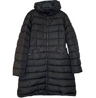 Full front view of black puffer jacket hanging on hanger