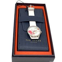 Ted Baker watch in original box with white leather strap and floral dial.