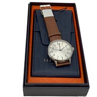 Ted Baker men's watch displayed in original box with branded pouch underneath strap.