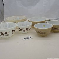 All six bowls arranged in two rows showing various sizes and patterns