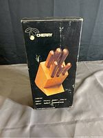 Original box showing brand name 'Cherry' with image of knife block and cutlery set.
