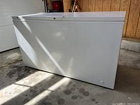 Front exterior view of the white chest freezer