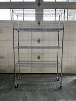 Full frontal view of five-tier wire shelving unit
