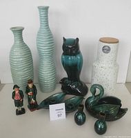 Full lot showing figurines, vases, animal plant holders, and carafe