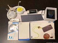 Overview photo showing all items in the lot on a white background.