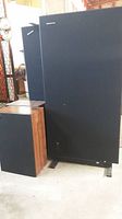 Front view showing two floor-standing and two bookshelf speakers