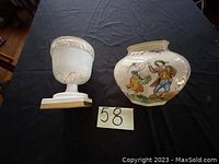 Two vases including the Villeroy & Boch vase shown with an index card 58