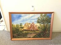 Frontal view of the framed original oil painting showing full landscape and vibrant colors.