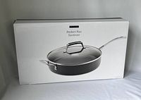 Box featuring image of the Epicure Perfect Pan Sauteuse showing black ceramic coated pan with glass lid and metal handles.
