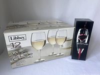 Box of 12 Libbey Wine & Dine Classic wine glasses alongside the boxed Venturi wine decanter