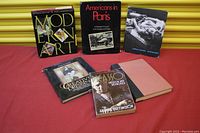 Image showing all six books together against yellow background.