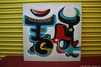 Front view of the abstract signed acrylic painting on canvas showing colorful shapes and symbols.