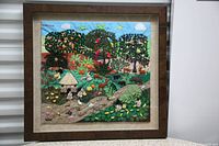 Framed colorful 3D handmade embroidered fabric artwork illustrating a Costa Rican harvest scene with flora and fauna.