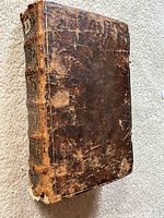 Leather bound volume front cover and spine, showing overall binding and wear