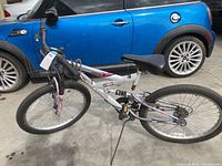 Full side view of Next Power Climber mountain bike with Roadmaster seat.