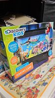Discovery Kids Marine Lamp packaging with aquatic themed imagery, showing product details including LED night light.