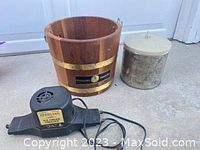 Wooden bucket, electric motor, and insulated container of Sterling electric ice cream maker.
