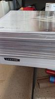 Stack of protective album covers labeled with Lifetime branding.