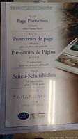 Front of packaging showing product name 'The Creative Memories Collection 12 x 12 Page Protectors' in multiple languages.