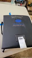 Closed black Creative Memories binder with seller's label reading 'Indexed Sticker Binder'