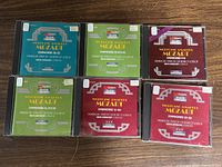 Photo showing 6 MCA Classics CDs of Mozart symphonies performed by Prague Symphony Orchestra, labeled with specific symphonies per CD.