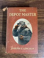 Front cover of the antique book showing title, author, and illustration.