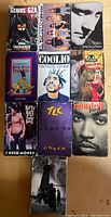 Photo showing 9 cassette singles from various 90s artists including GZA, Spice Girls, Phil Collins, Coolio, 2 Live Crew, Marky Mark, TLC, and Montell Jordan. Sleeves show some wear.